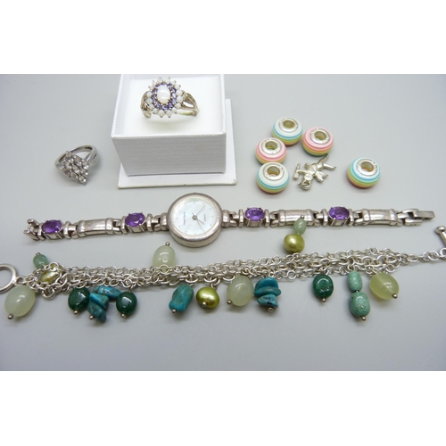 7139 - Silver jewellery - a silver gilt opal and amethyst ring, silver beads, a watch set with amethysts, b... 