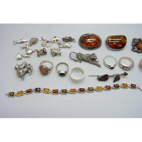 7154 - A collection of silver and white metal jewellery including amber set, 73g marked as silver