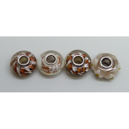 7159 - Four Pandora style beads with silver core