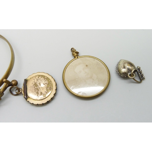 7163 - A collection of Victorian jewellery; two pendants, two photograph pendants, a locket and a mining ba... 