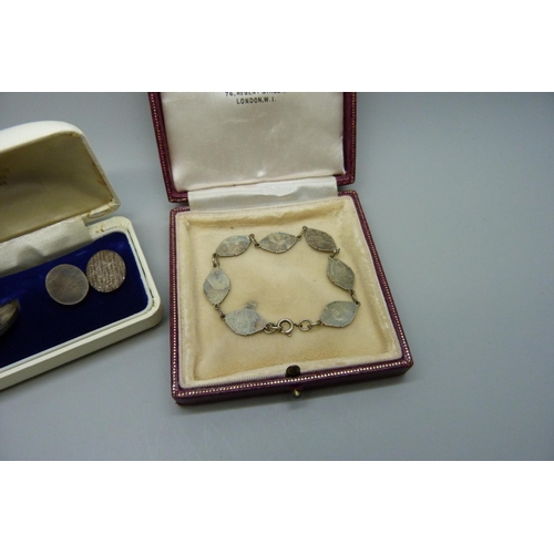 7174 - A pair of textured silver cufflinks, 17.7g, and a Delft silver bracelet