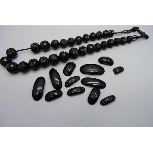 7175 - A Whitby jet bead necklace and jet beads for stringing or repair