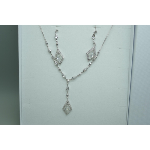 7232 - A silver necklace with marquise drop earrings, 5.6g