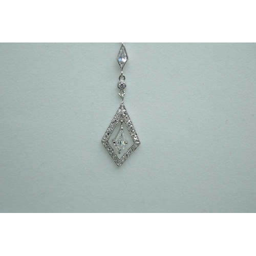 7232 - A silver necklace with marquise drop earrings, 5.6g