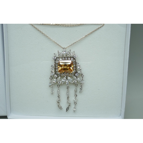 7245 - An ornate silver and cubic zirconia pendant, 12.8g