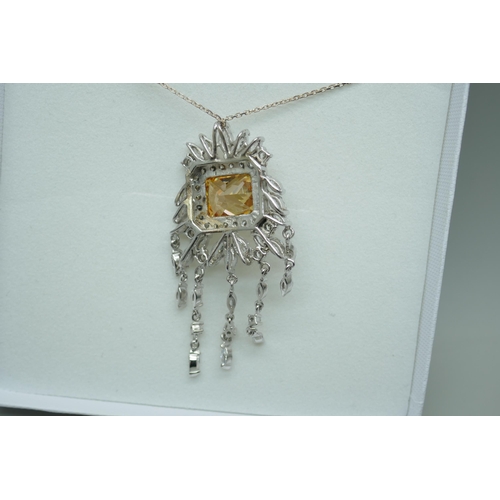 7245 - An ornate silver and cubic zirconia pendant, 12.8g