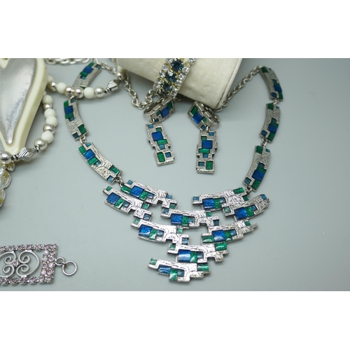 7247 - A collection of silver tone jewellery including a Miracle set, (earrings and necklace), and other na... 