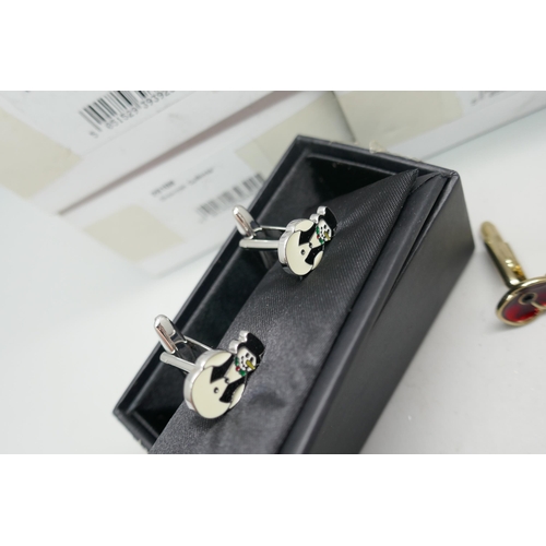 7252 - A collection of Christmas themed cufflinks, (snowmen)