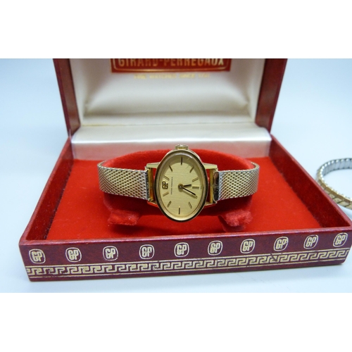 7277 - A Girard-Perregaux lady's wristwatch, boxed, together with another wristwatch