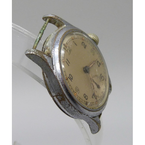 7280 - A military wristwatch head, marked with broad arrow and ATP, 30mm case