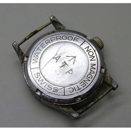 7280 - A military wristwatch head, marked with broad arrow and ATP, 30mm case