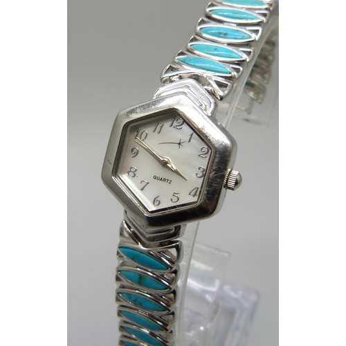 7294 - A lady's silver wristwatch with turquoise set bracelet and mother of pearl dial