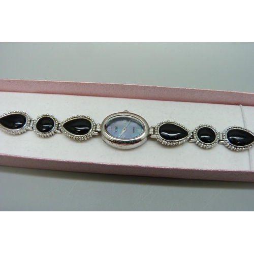 7294A - A silver and onyx wristwatch