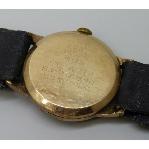 7295 - A 9ct gold cased Smiths De Luxe wristwatch, case back bears inscription, 30mm