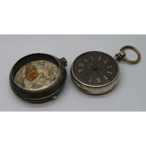 7306 - A silver cased pocket watch with silver dial and gold applied numerals, inner case marked Birmingham... 