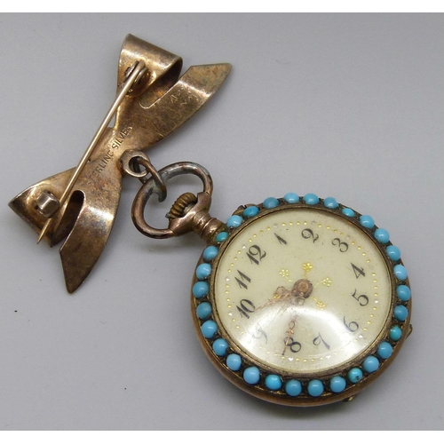 7307 - Two fob watches, one on a silver bow brooch set with turquoise, and an enamelled example with Fleur-... 