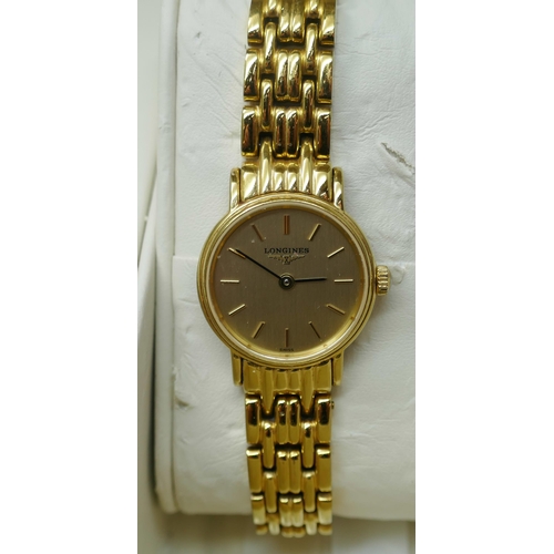 7308 - A lady's Longine wristwatch, gold plated, model number 42192328 with certificate and paperwork, boxe... 