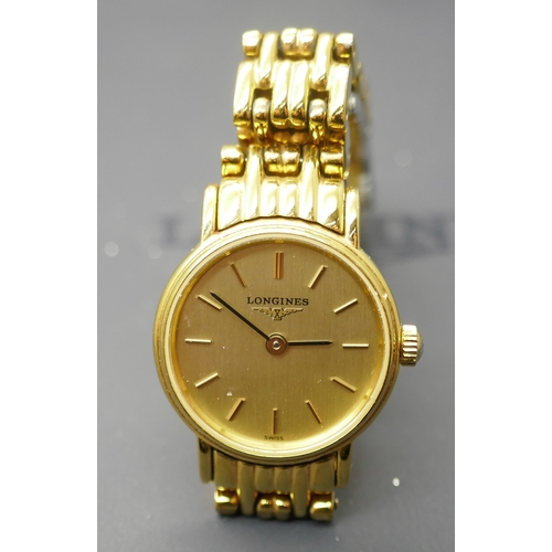 7308 - A lady's Longine wristwatch, gold plated, model number 42192328 with certificate and paperwork, boxe... 