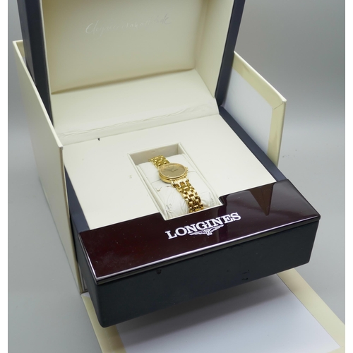 7308 - A lady's Longine wristwatch, gold plated, model number 42192328 with certificate and paperwork, boxe... 