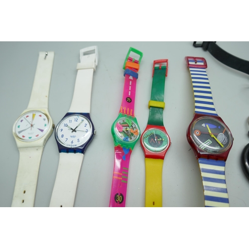 7309 - Nine Swatch watches, (four require straps)