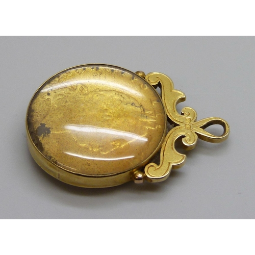 7319 - A George III full guinea in a Victorian 18ct gold mount hallmarked Birmingham 1888, total weight 19.... 