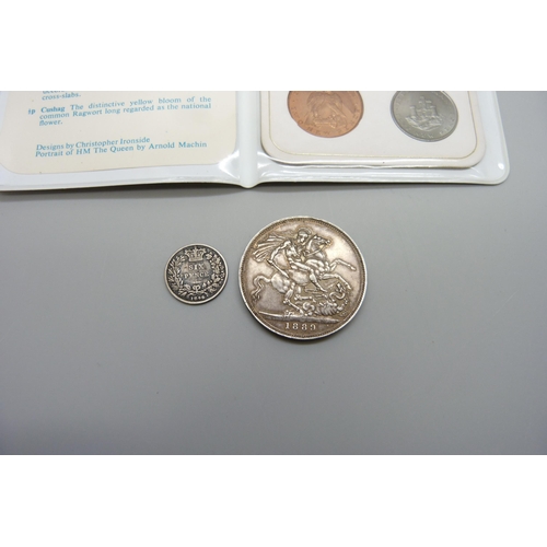 7331 - A Victorian 1889 crown, an 1846 sixpence and a 1971 Isle of Man decimal coins set