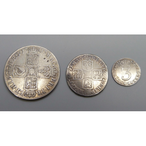 7332 - Coins; three Queen Anne silver coins, 1707 half-crown, 1711 shilling and 1709 3d