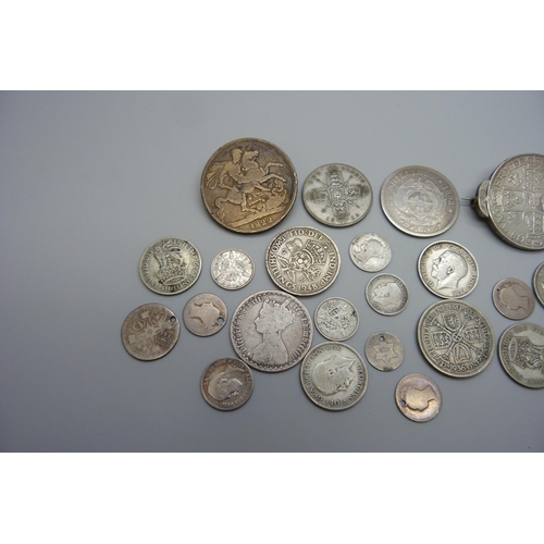 7334 - Coins; a Queen Anne crown and a George IV crown, both with pin mounts, other pre 1920 silver coins i... 