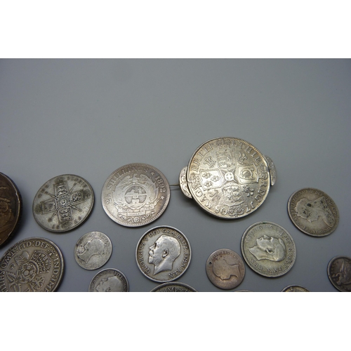 7334 - Coins; a Queen Anne crown and a George IV crown, both with pin mounts, other pre 1920 silver coins i... 