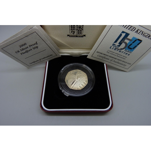 7336 - Coins; a year 2000 Public Libraries silver Piedfort proof 50p coin, with certificate