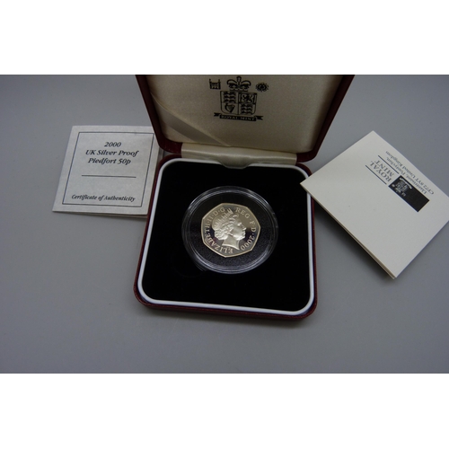 7336 - Coins; a year 2000 Public Libraries silver Piedfort proof 50p coin, with certificate