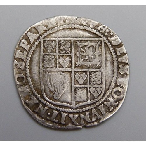 7339 - Coins; a James I silver shilling, (1603-1625)