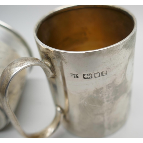 7362 - A hallmarked silver mug, 99g, and one other marked Empire Sterling, 45g