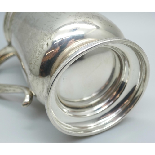 7367 - A silver mug with inscription dated 1937, 296g, height 128mm