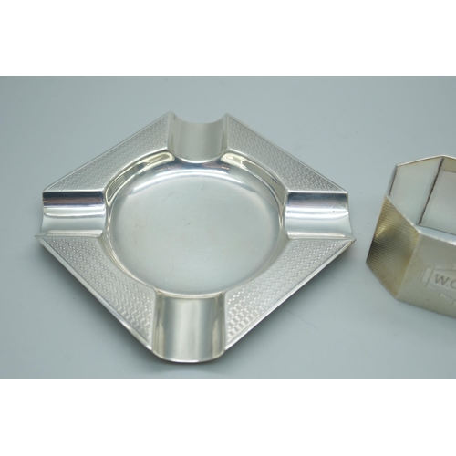 7370 - A silver ashtray and a silver napkin ring, 59g