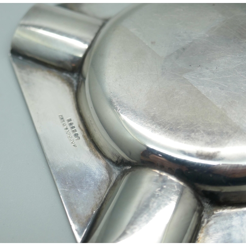 7370 - A silver ashtray and a silver napkin ring, 59g