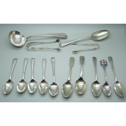 7372 - A collection of silver spoons, 178g, a plated ladle and three other plated items