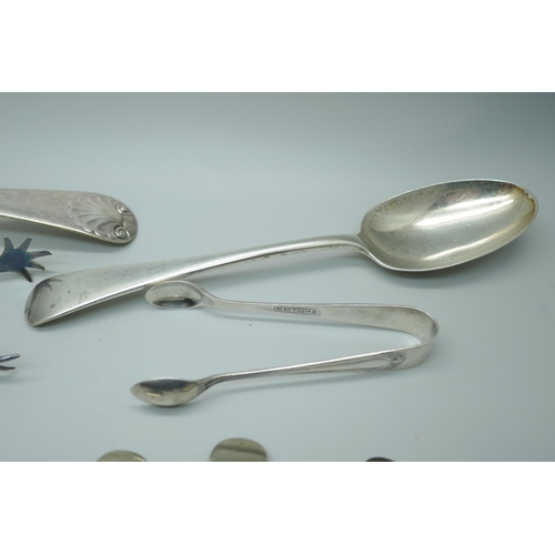 7372 - A collection of silver spoons, 178g, a plated ladle and three other plated items