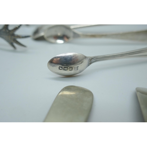 7372 - A collection of silver spoons, 178g, a plated ladle and three other plated items