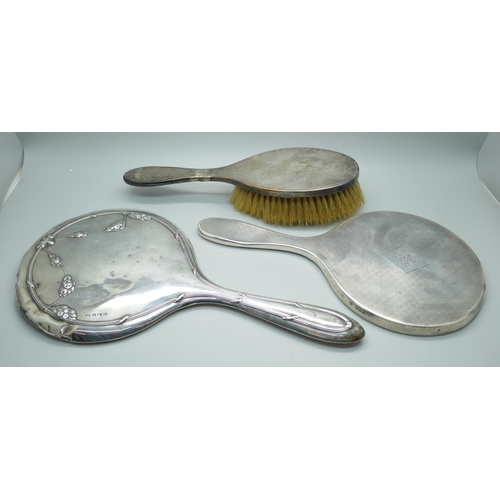 7374 - Two silver backed mirrors and a brush, a/f