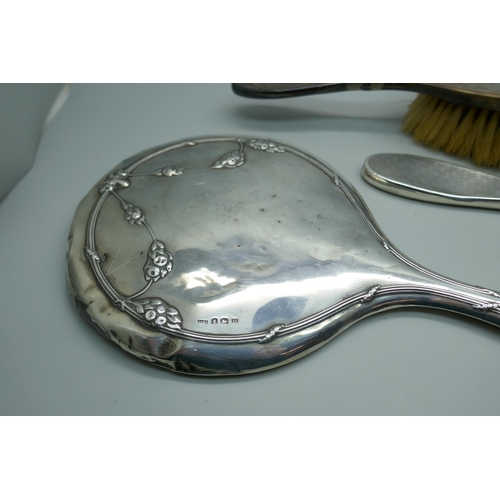 7374 - Two silver backed mirrors and a brush, a/f