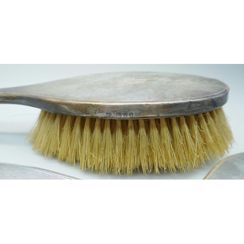 7374 - Two silver backed mirrors and a brush, a/f