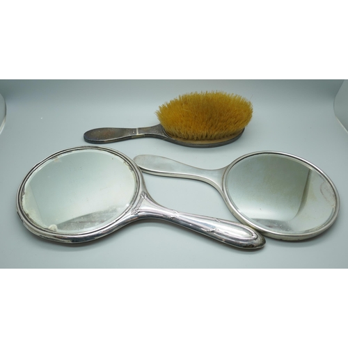 7374 - Two silver backed mirrors and a brush, a/f