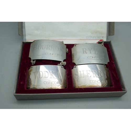 7377 - A set of four hallmarked silver British Airways Concorde spirit labels, Birmingham 1986, boxed, 58.4... 