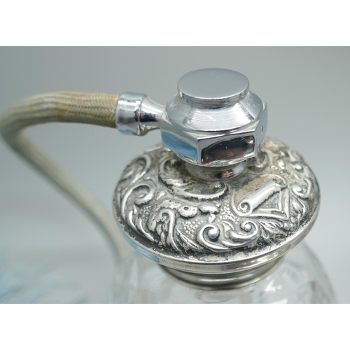 7380 - A William Comyns silver topped glass jar, London 1899, a silver topped powder jar, a/f, and a scent ... 