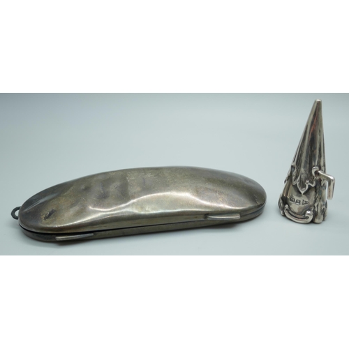 7381 - A silver spectacles case, a/f, and a silver candle snuffer