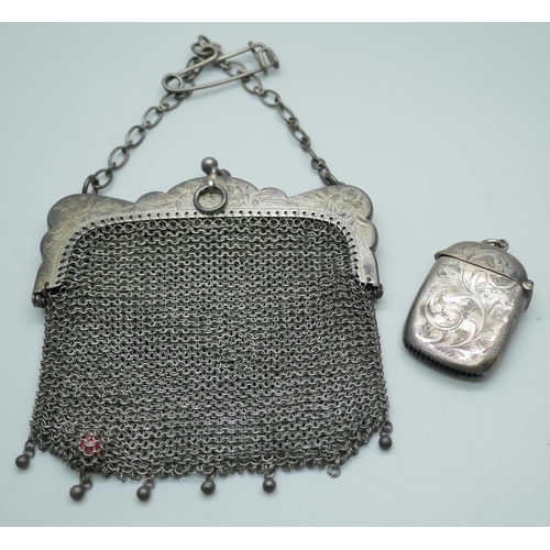 7382 - A white metal purse and a silver vesta case