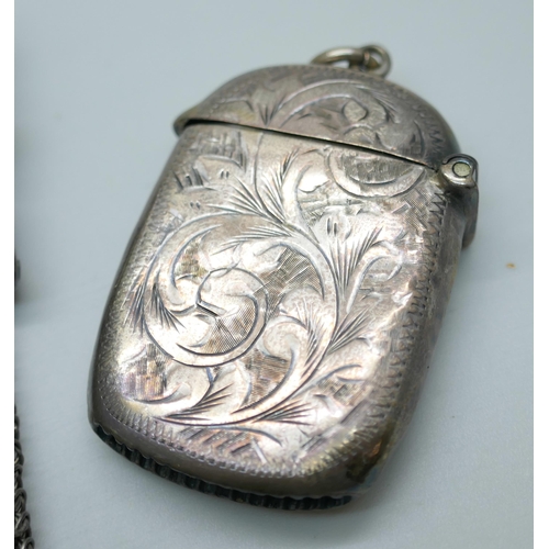 7382 - A white metal purse and a silver vesta case