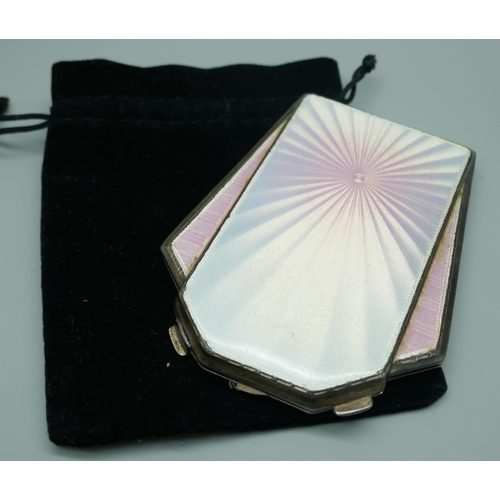 7391 - A silver and enamelled Art Deco compact