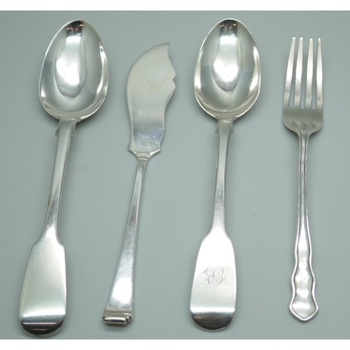 7393 - Two Victorian silver spoons, a silver fork and a silver spreader, 83g